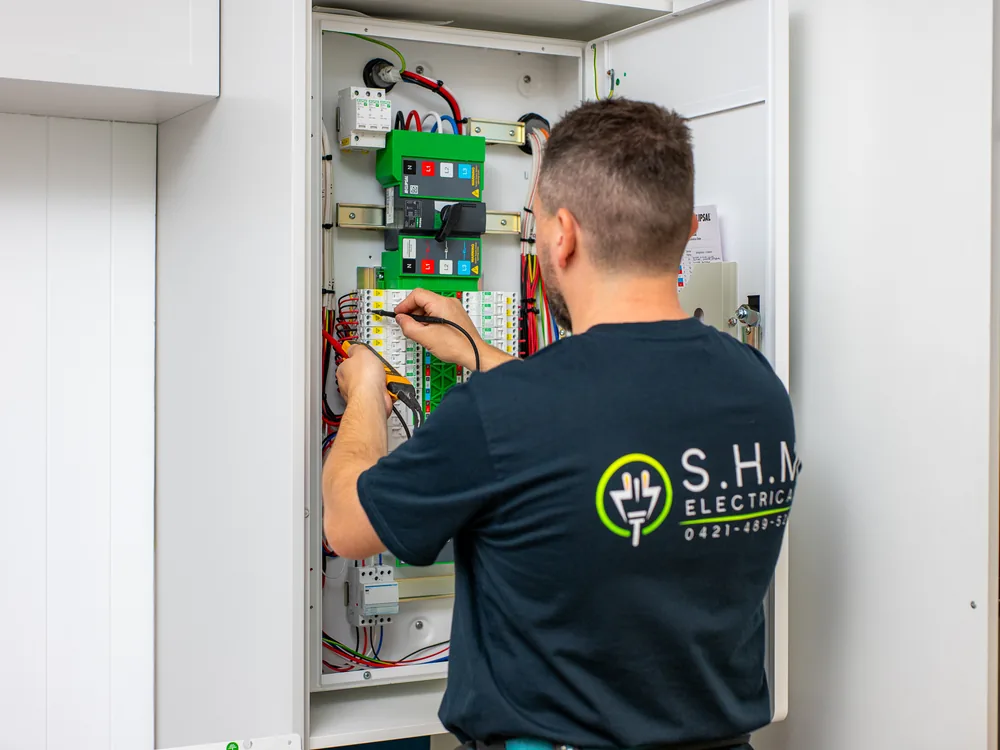 S.H.M Electrical electrician wiring a newly upgraded residential switchboard